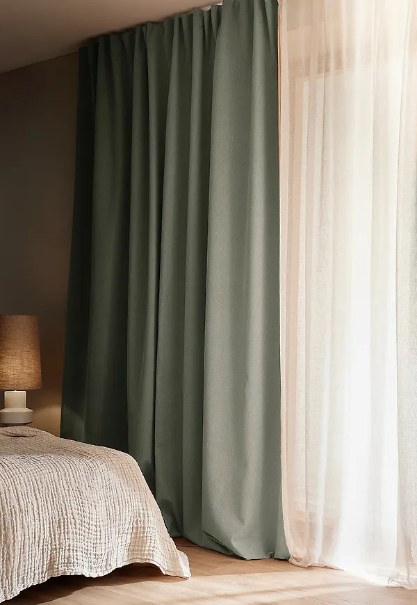 Grön Ellos Home-gardin i exklusiv modell.