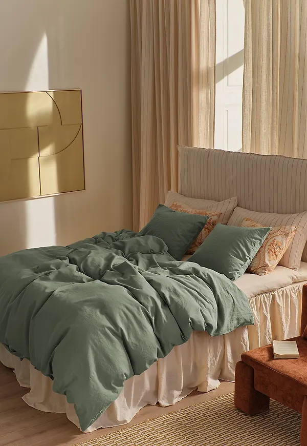 Grön Ellos Home-bomullsgardin i fantastiskt snygg modell.
