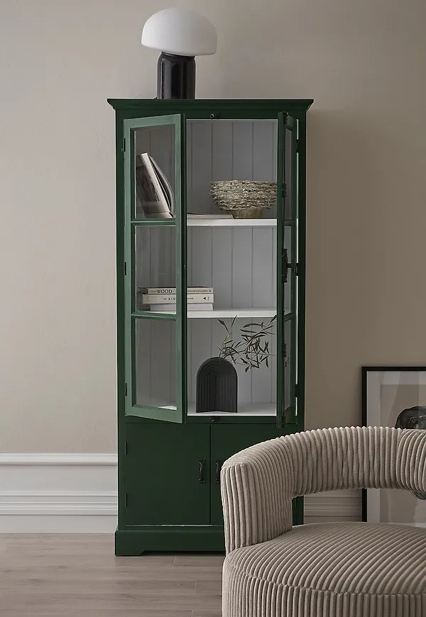 Grön Ellos Home-skåp i riktigt fin modell.