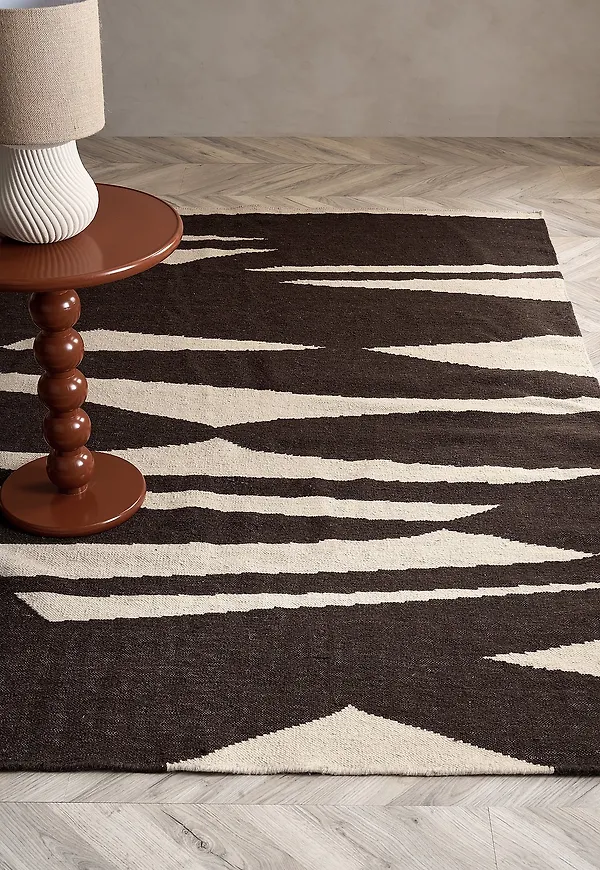 Beige ullmatta som passar perfekt till sommaren 2025!