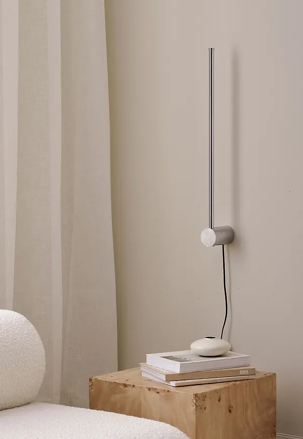 Riktigt fin vägglampa i aluminium från Ellos Home.