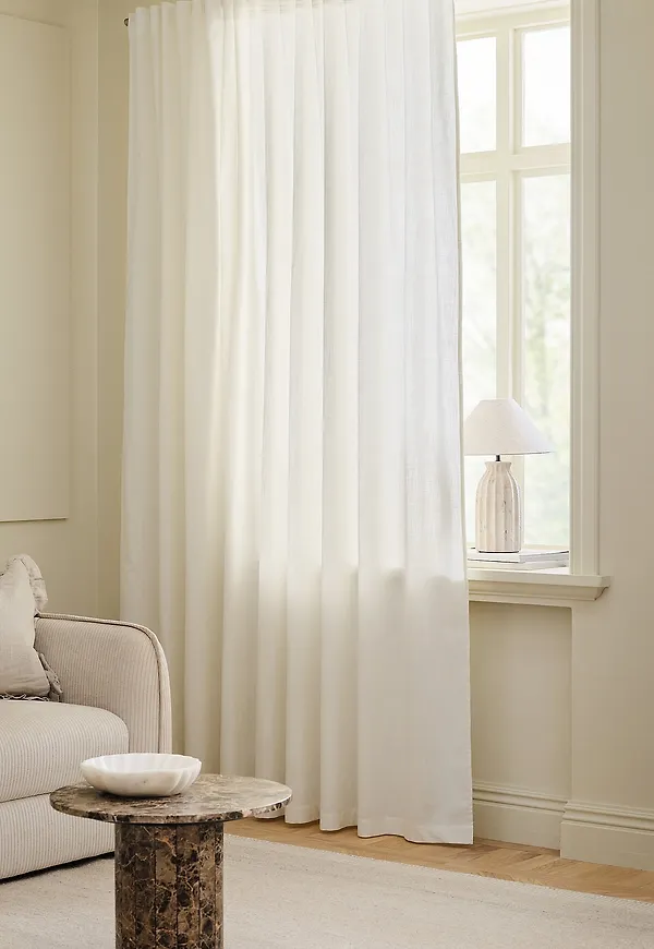 Mysig gardin i vitt från Ellos Home.