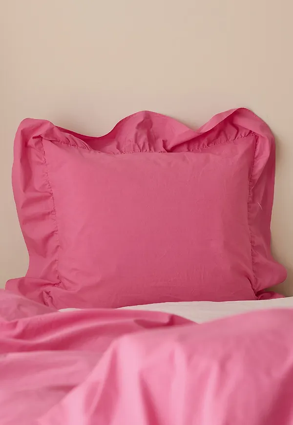 Skön sängkläder i rosa färg gjord i bomull.