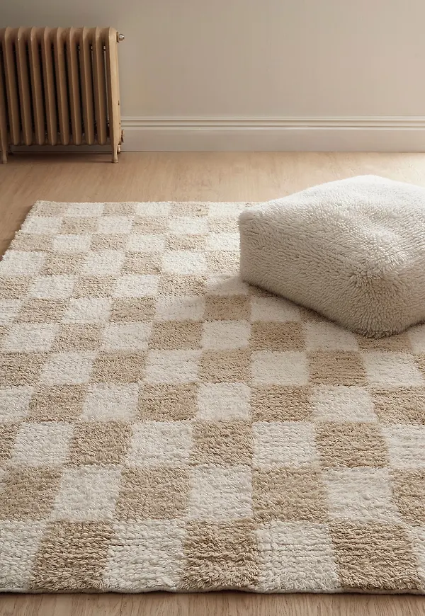 Skön ellos home ellos matta i beige färg gjord i ull.