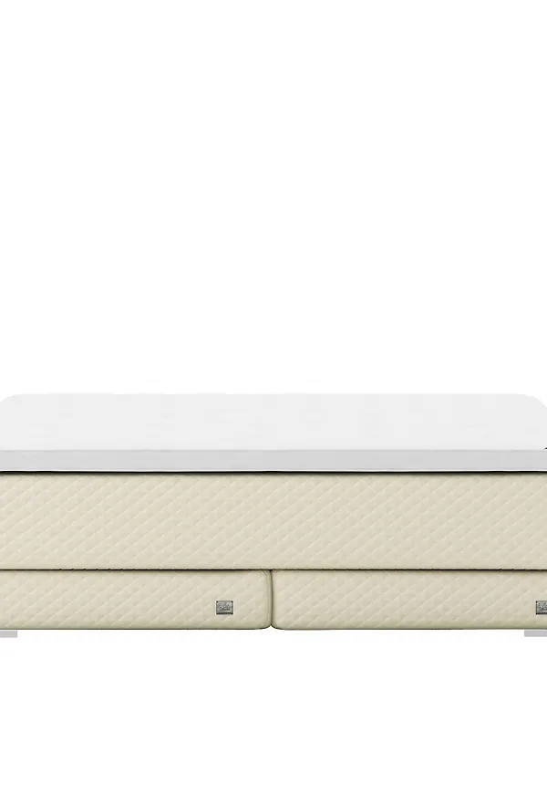 Riktigt snygg dubbelsäng i beige färg gjord i aluminium.