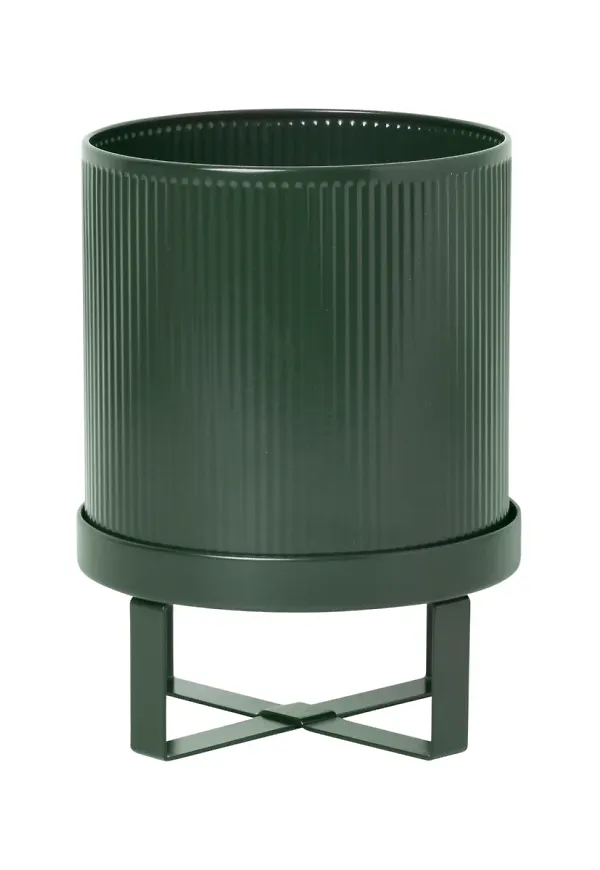 Grön FERM LIVING-kruka i snygg modell.