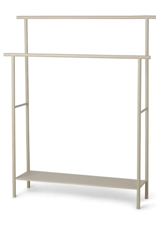 Beige FERM LIVING-handdukshängare i söt modell.