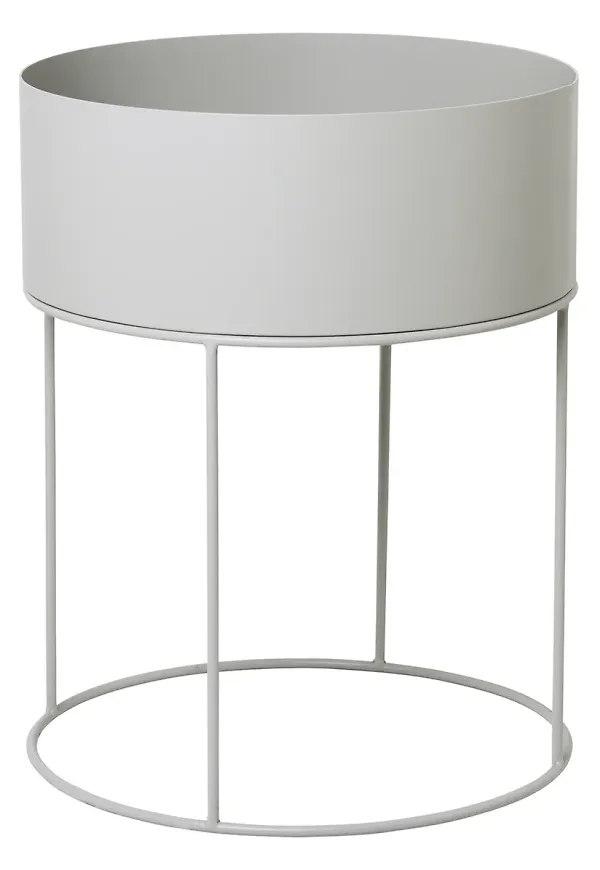 Grå FERM LIVING-kruka i mysig modell.