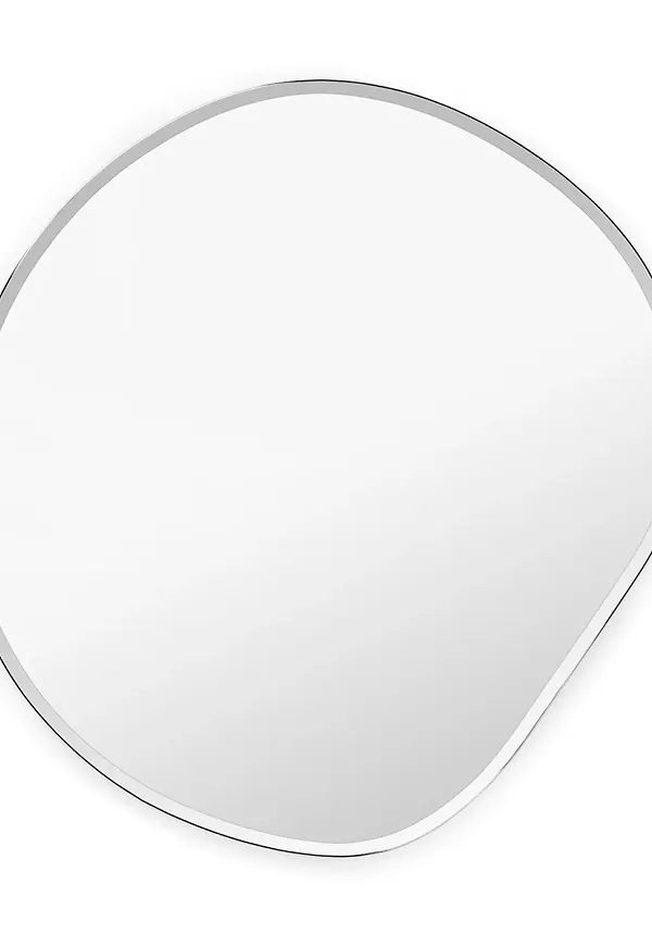Silverfärgad FERM LIVING-spegel i komfortabel modell.