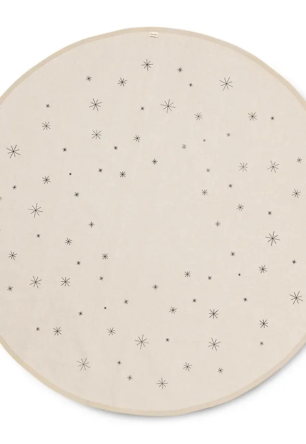 Beige FERM LIVING-julgransmatta i snygg modell.