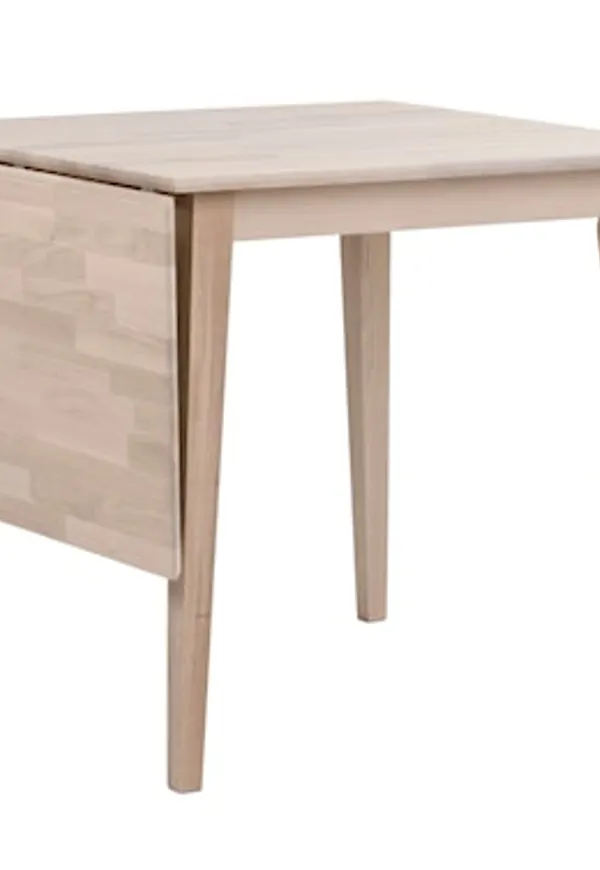 Härlig beige matbord i ek från Rowico Home.
