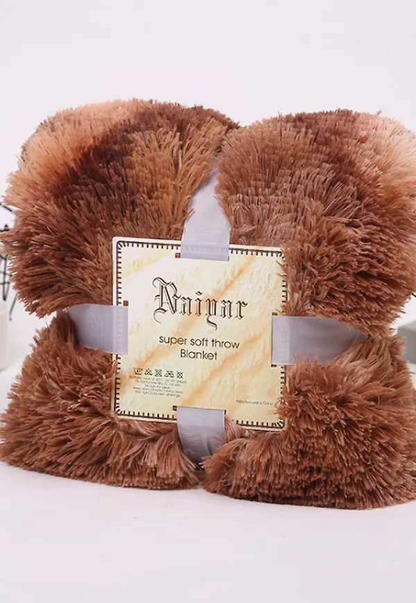 Brun TC Home-filt i trendig modell.