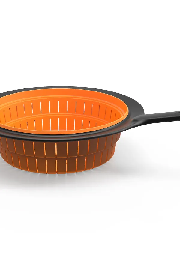 Orange Fiskars-durkslag i fantastiskt snygg modell.
