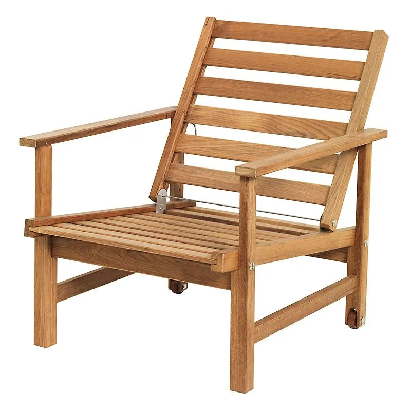 Fantastiskt fin fåtölj i teak från Fri Form.