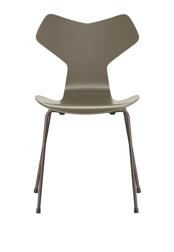 Grön Fritz Hansen-matstol i stilriktig modell.