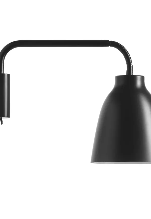 Supersnygg svart vägglampa 2025 från Fritz Hansen.