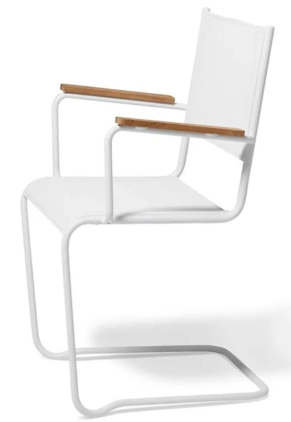 Vacker fåtölj i teak från Fri Form.