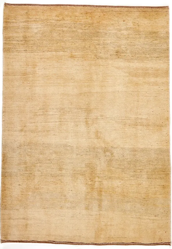 Beige ullmatta som passar perfekt till sommaren 2025!