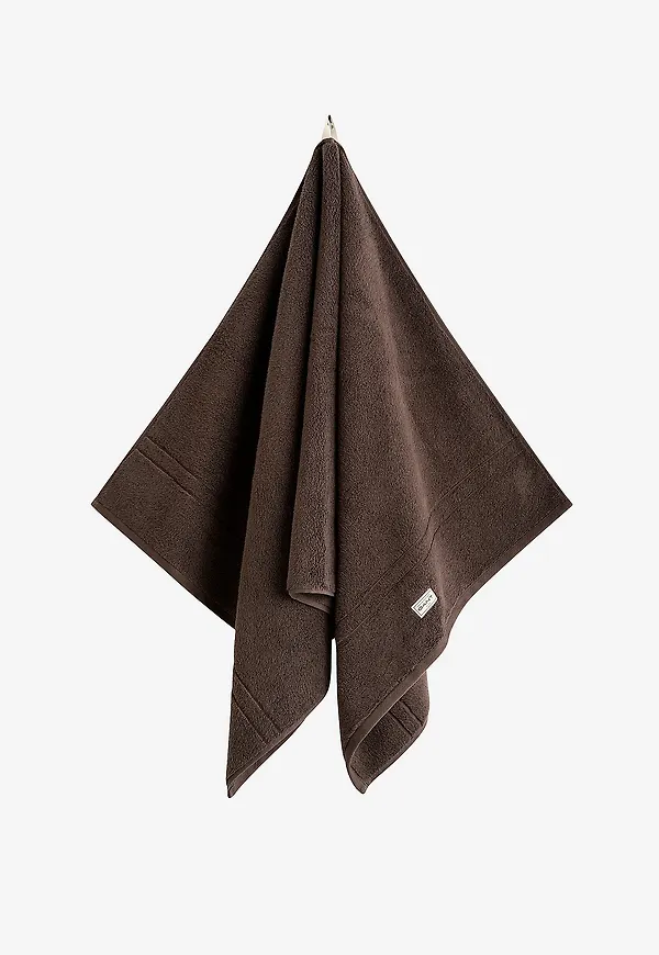 Brun Gant Home-handduk i otroligt fin modell.