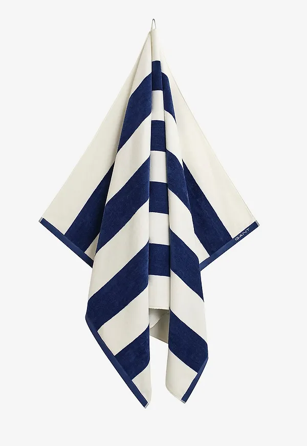 Blå Gant Home-strandhandduk i snygg modell.