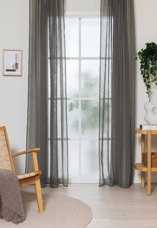Grön KM Home-öljettgardin i komfortabel modell.