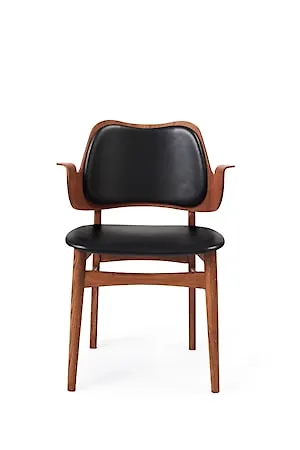 Exklusiv matbordsstol i ek i svart från Warm Nordic.