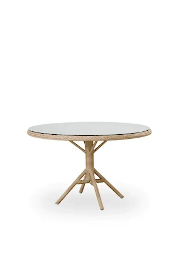 Stilriktig matbord i beige färg gjord i aluminium.