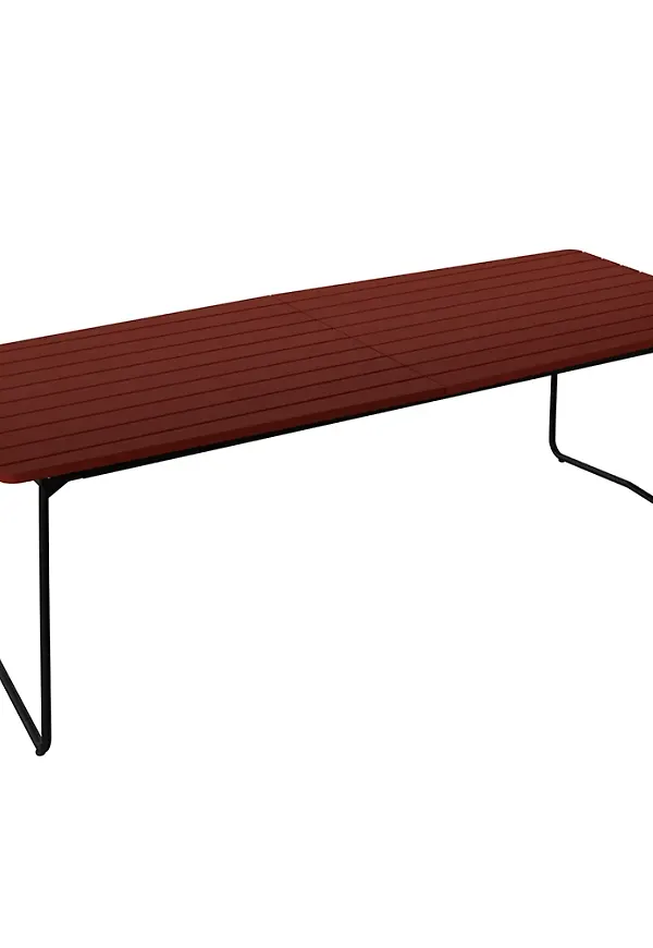 Komfortabel ekmatbord i mörkrött från Grythyttan Stålmöbler.