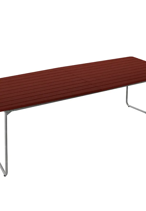 Stilriktig bord i mörkröd färg gjord i ek.