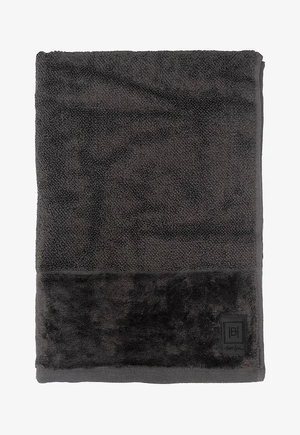 Riktigt fin viskosmatta i grått från Halvor Bakke.