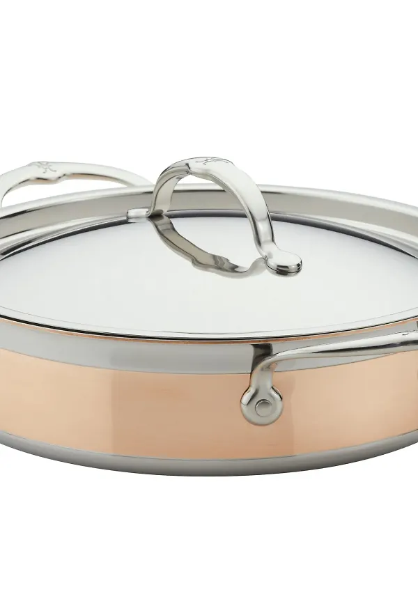 Guldfärgad Hestan-traktörpanna i jättesnygg modell.