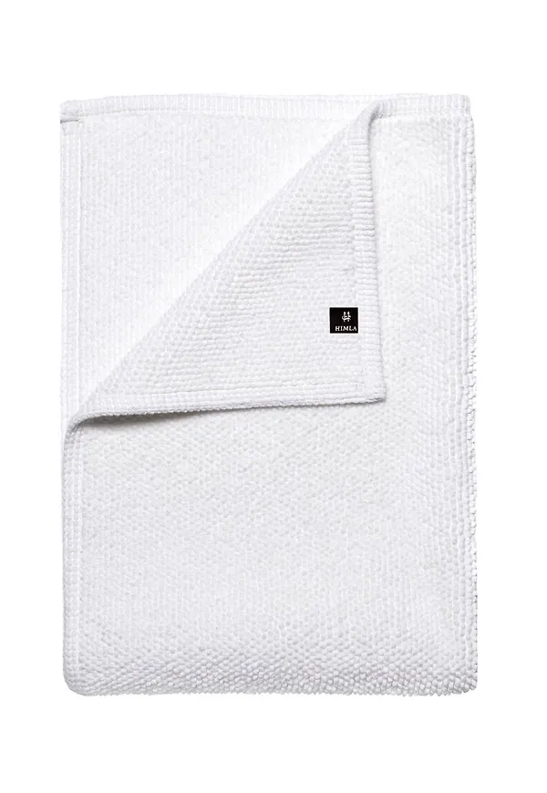 Fantastiskt snygg badrumsmatta i vit färg gjord i bomull.