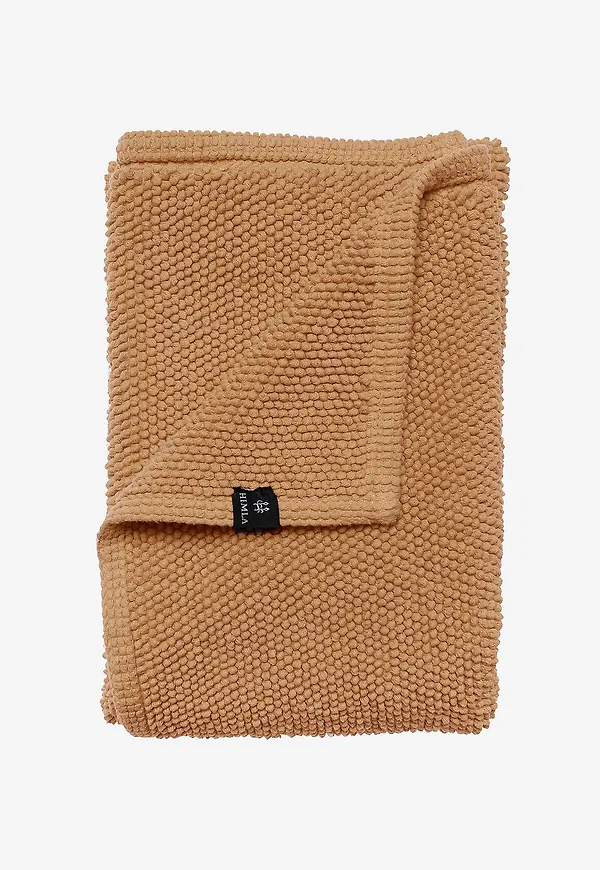 Komfortabel badmatta i brunt från Himla.