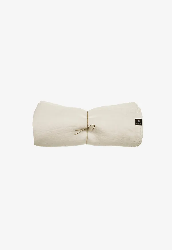 Beige Himla-lakan i vacker modell.