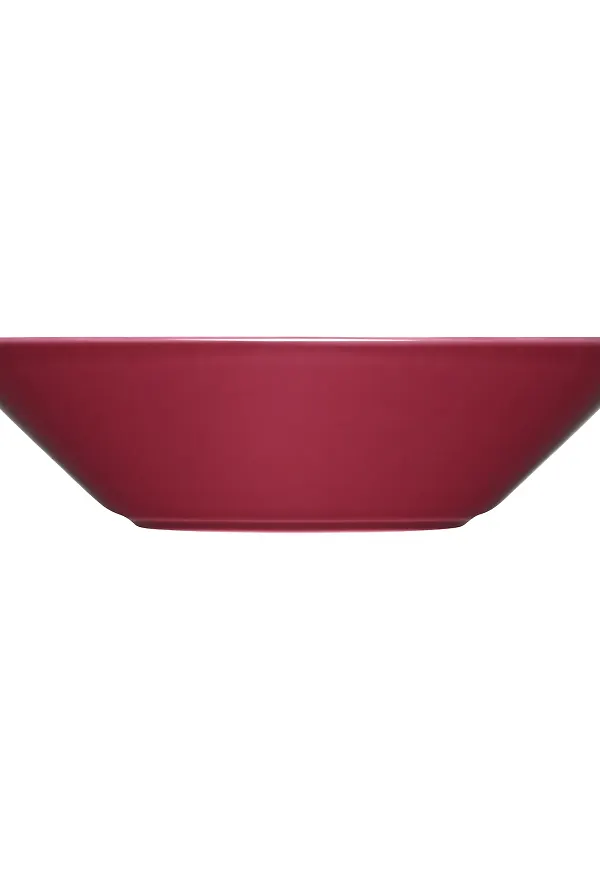 Röd Iittala-djup tallrik i mysig modell.