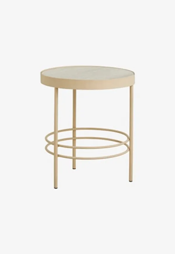 Komfortabel nordal bord i beige färg gjord i järn.