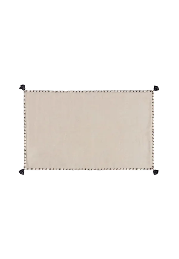 Riktigt snygg beige matta i bomull från Kave Home.