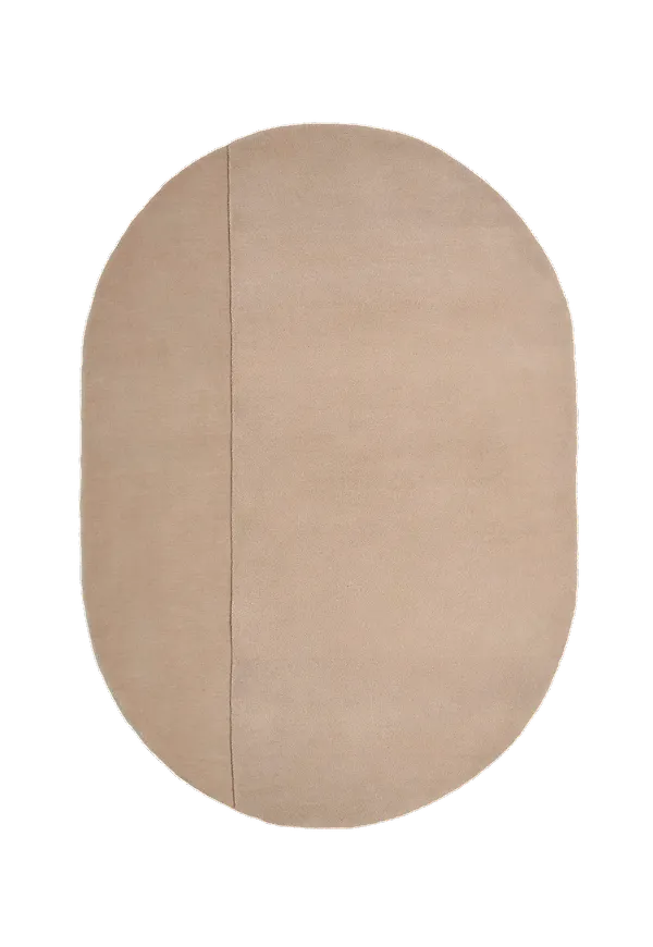 Mysig matta i beige färg gjord i ull.