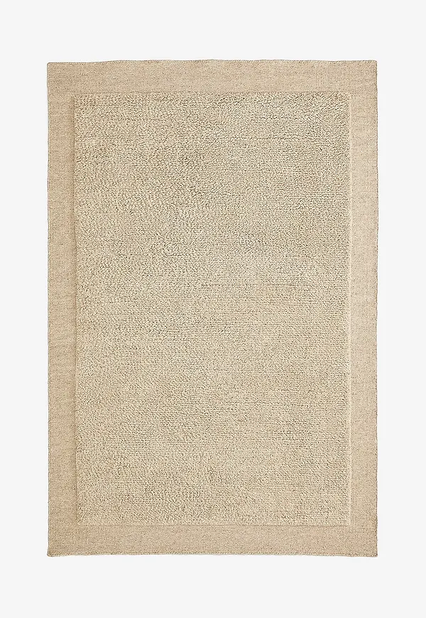 Jättefin beige ullmatta 2025 från Kave Home.