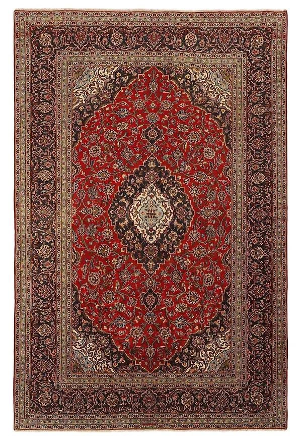 Härlig ullmatta i rött från Rezas.