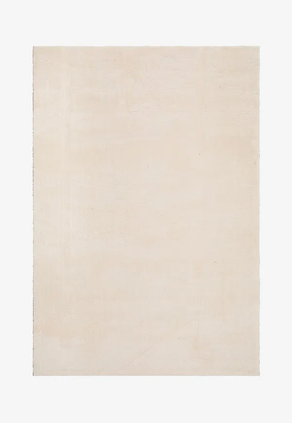 Otroligt fin matta i beiget från KM Home.