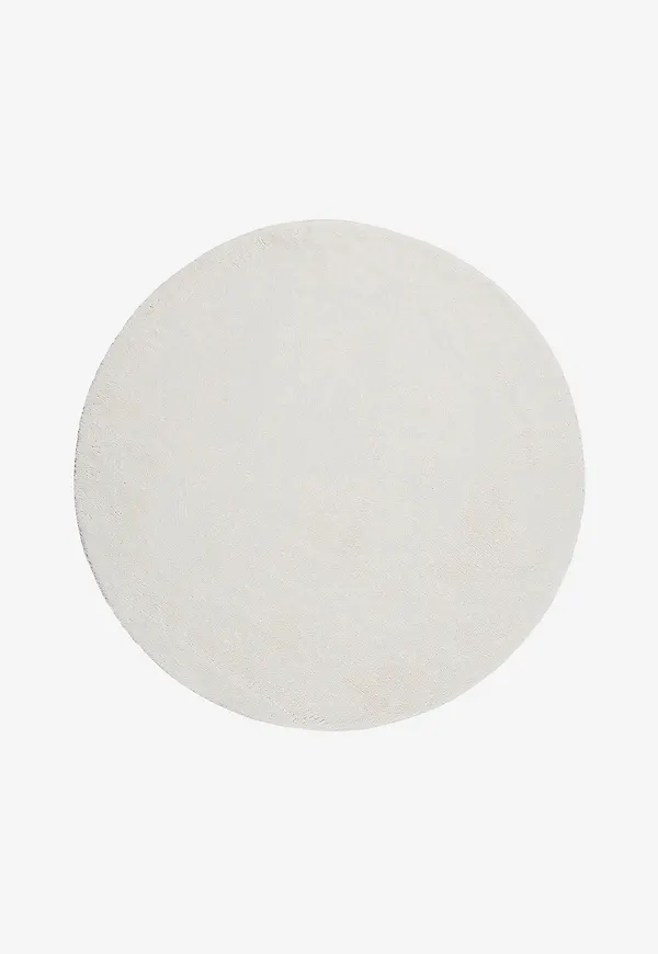 Stilren matta i vitt från KM Home.