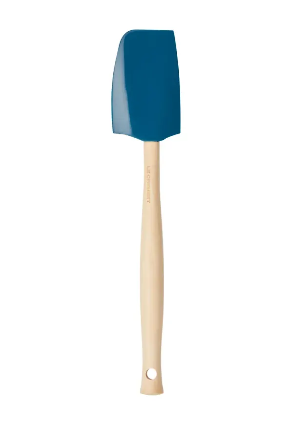 Blå Le Creuset-slickepott i modern modell.