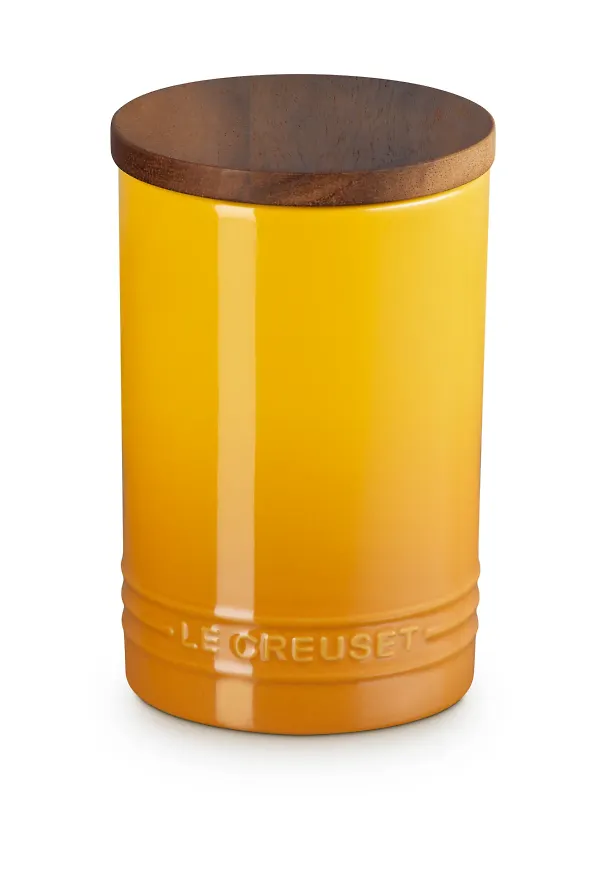 Gul Le Creuset-förvaringsburk i modern modell.