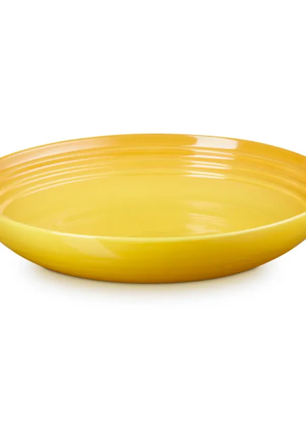 Gul Le Creuset-pastatallrik i riktigt fin modell.