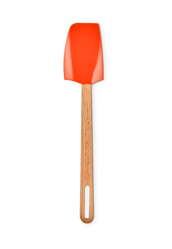 Röd Le Creuset-slickepott i vacker modell.