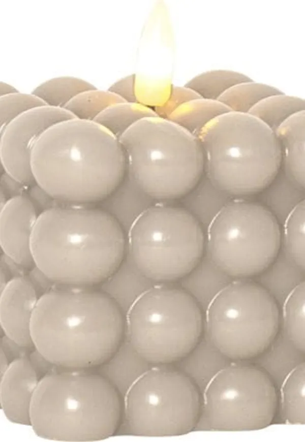 Beige Star Trading-blockljus i snygg modell.
