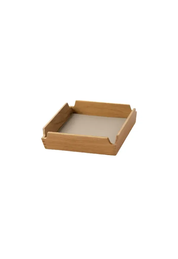 Brun LIND DNA-bricka i riktigt snygg modell.