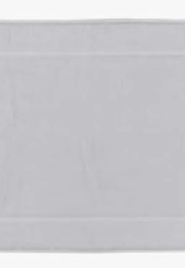 Vit hemtex-bomullsbadrumsmatta i stilriktig modell.