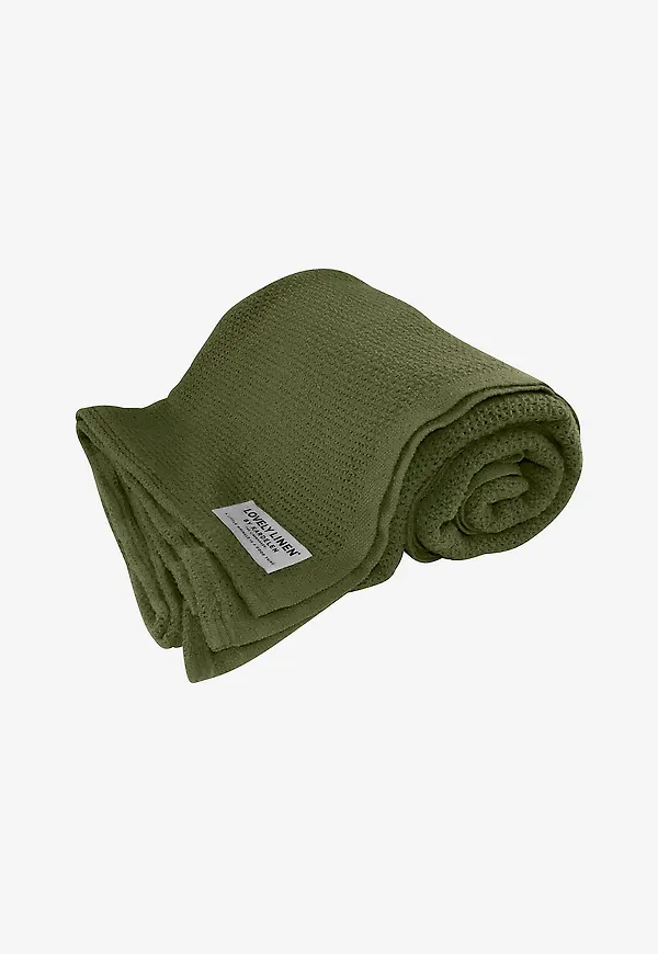 Grön Lovely Linen-filt i jättefin modell.